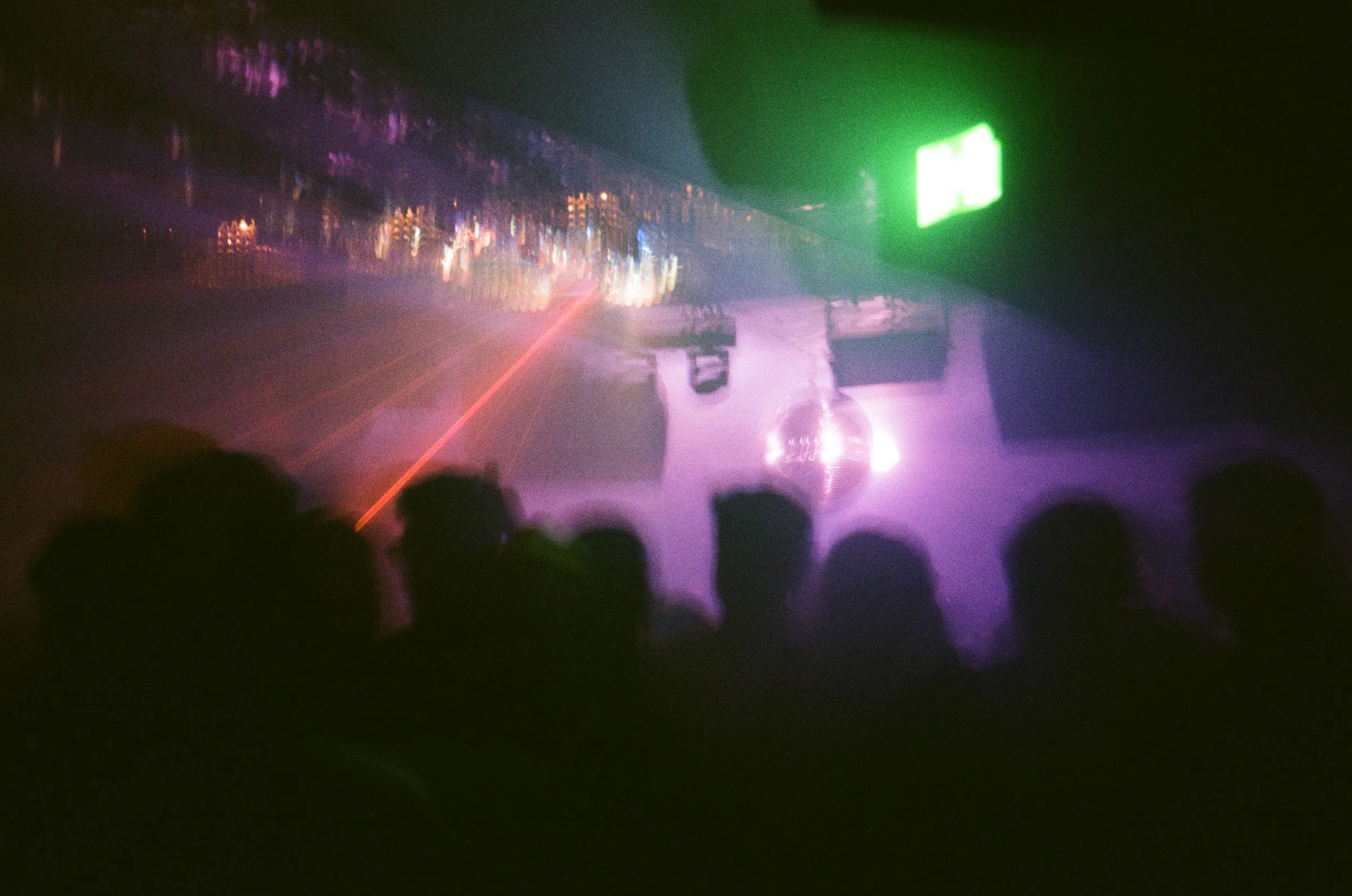 Crowd under pink lasers
