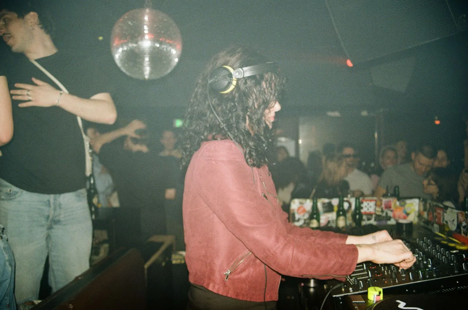 Lucie Frank playing in a red leather jacket